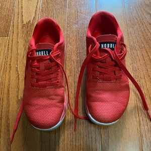Woman’s Size 6.5 Red NOBULL athletic sneakers.